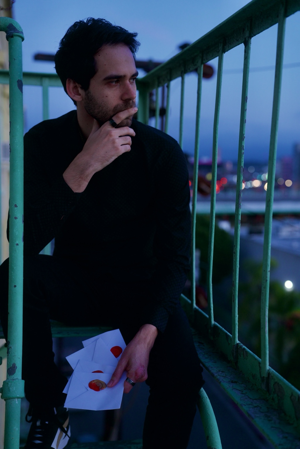 LUPO holding letters on a stairwell